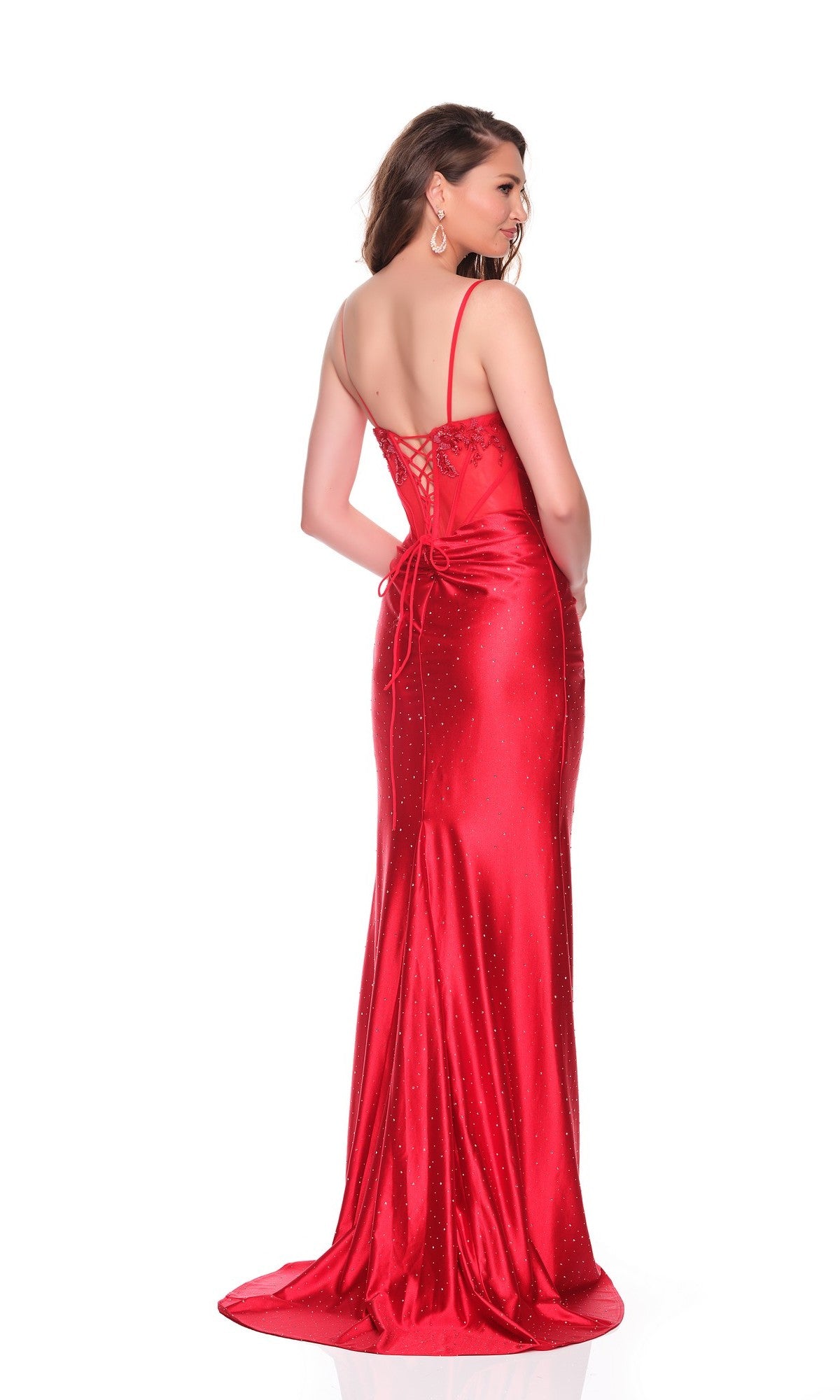 A woman stands facing away in the Dave and Johnny 12755 long prom dress, featuring a red lace-up back and elegant silhouette against a white background—ideal for any special occasion.